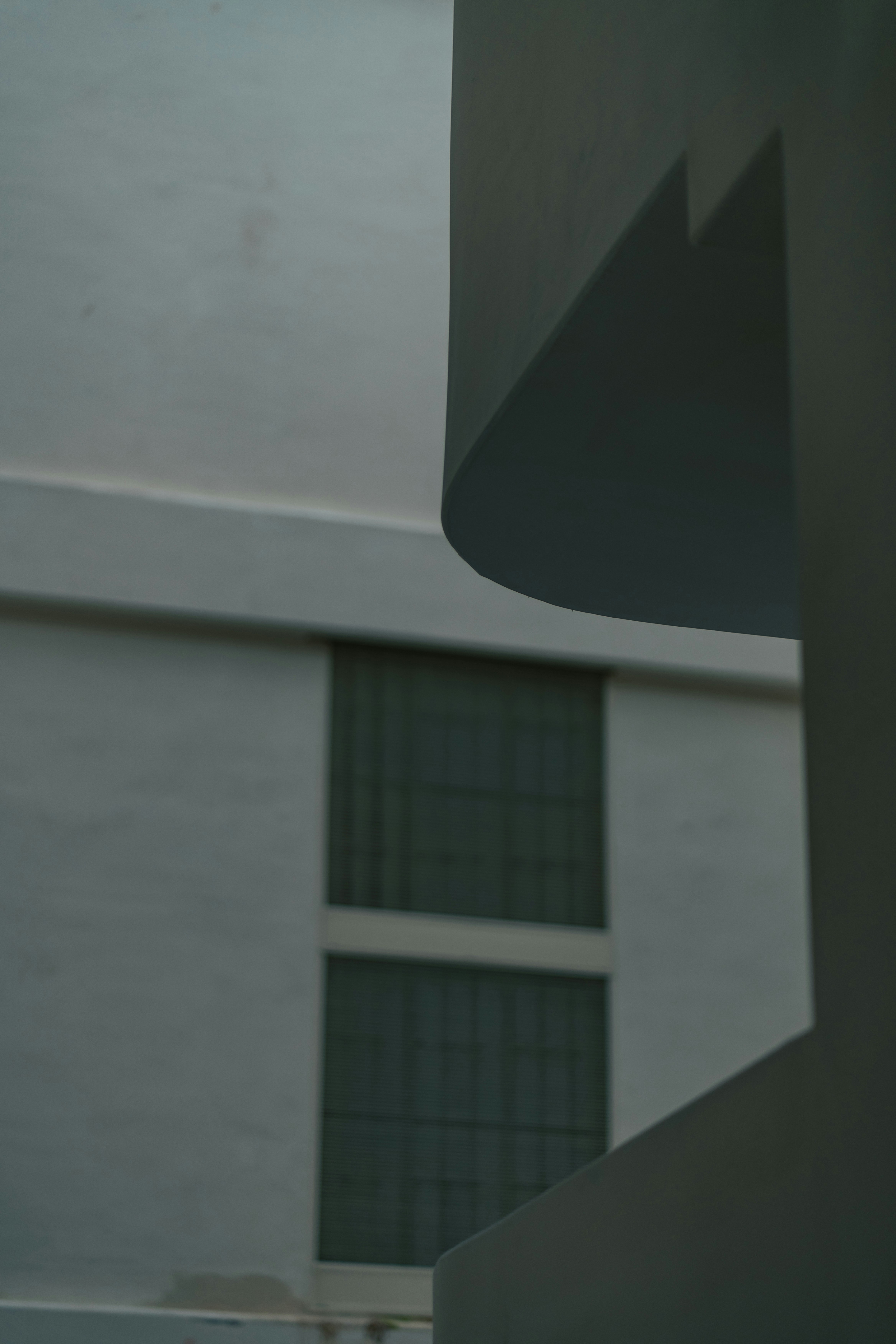 a close up of a building with a building in the background